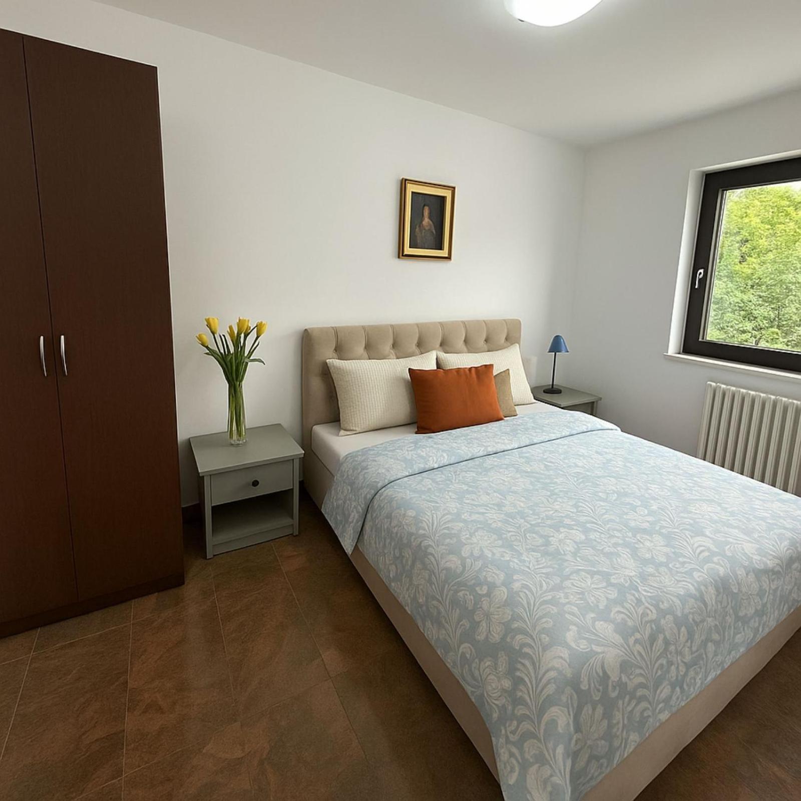 Appartamento Bilocale Deluxe con Terrazza e Vista Giardino